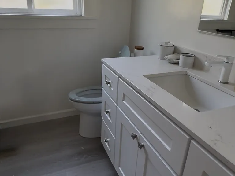 Upstairs bathroom w/ newer vanity