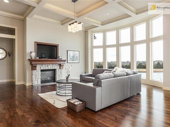Lovely stone fireplace, bay windows, beautiful ceiling details and freshly finished hardwoods make this home a 10. BTW, enjoy the amazing views!