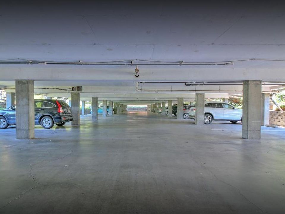 garage in the basement with an assigned spot