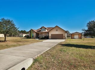 11457 Oak Springs Dr, Willis, TX 77378