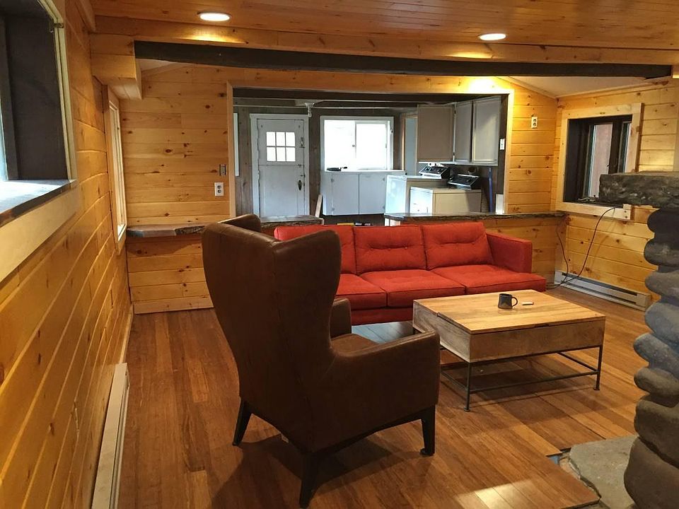 Living room and kitchen in the distance