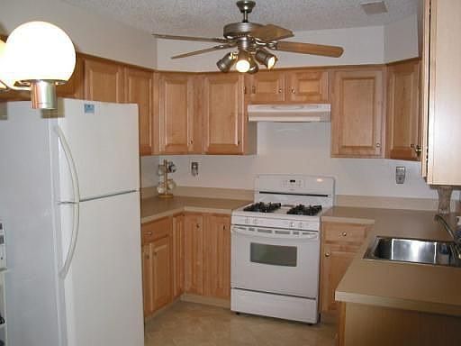 Natural Cabinetry & Pewter Knobs