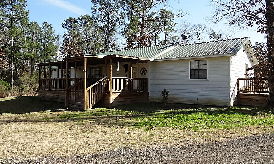 Restored country home in 2006 with left and right additions and front and back porches. Front porch 