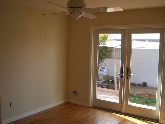 2nd bedroom with french doors to yard