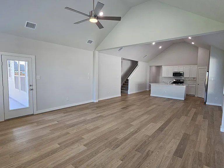 Clean, bright, and inviting_experience the glow of natural light across these stunning floors