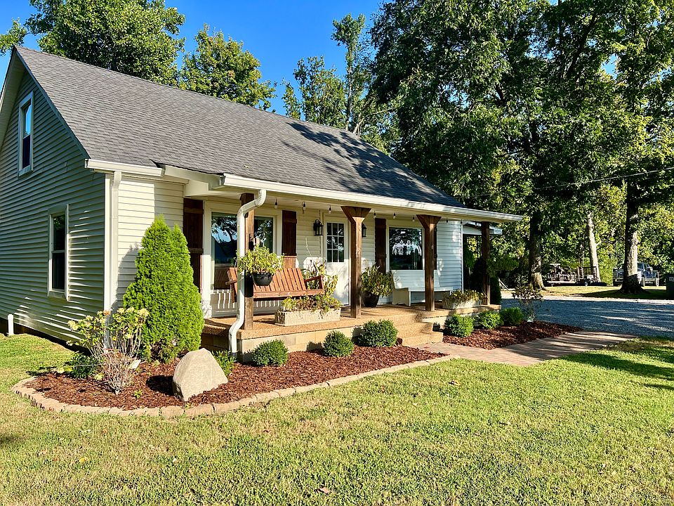 Beautiful landscaping and large front covered porch.