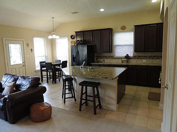 Open Living room overlooking Kitchen
