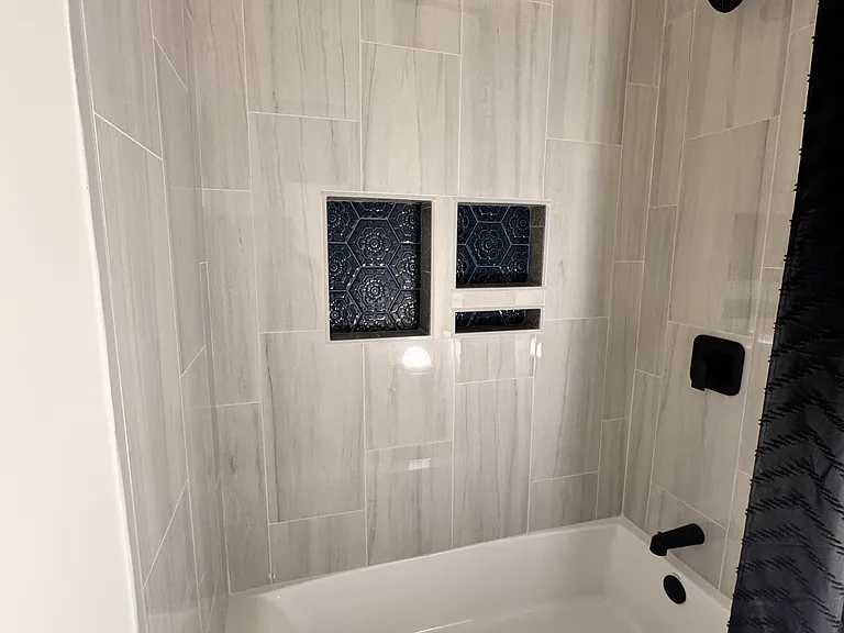 Guest bathroom shower with tub