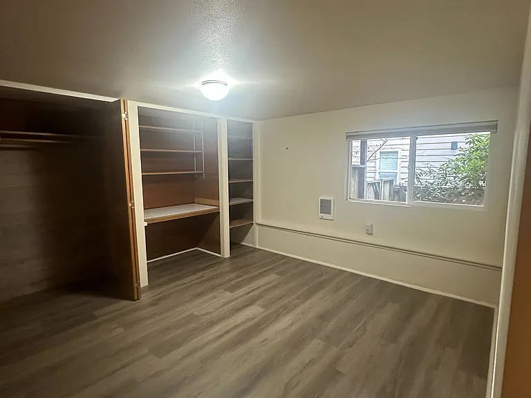 Second bedroom shown unfurnished.