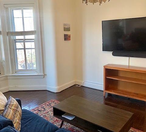 Sofa, coffee table and TV in the living room