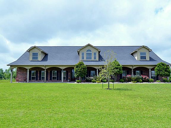 A huge front yard perfect for fun this summer. Blueprints and floor plans available.