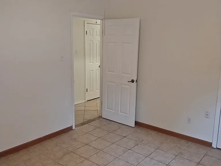 Front Bedroom looking back at Hallway.