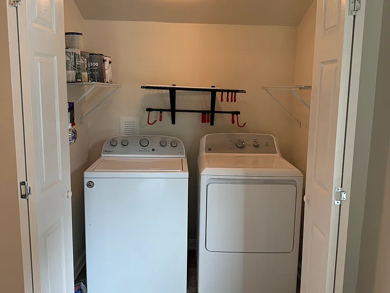 Laundry closet, washer and dryer included in-unit