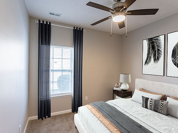 Experience comfort and style in this beautifully designed modern bedroom.