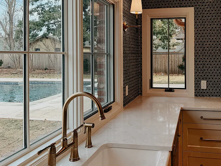 Kitchen view to pool and spacious grounds