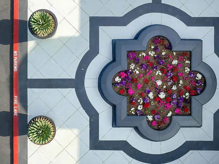 Stylish Garden Courtyard with Colorful Blooms at Villas at the Gardens