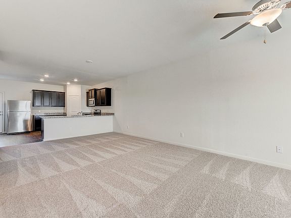 The family room offers great natural light and soaring ceilings.