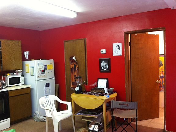 Kitchen with small fridge