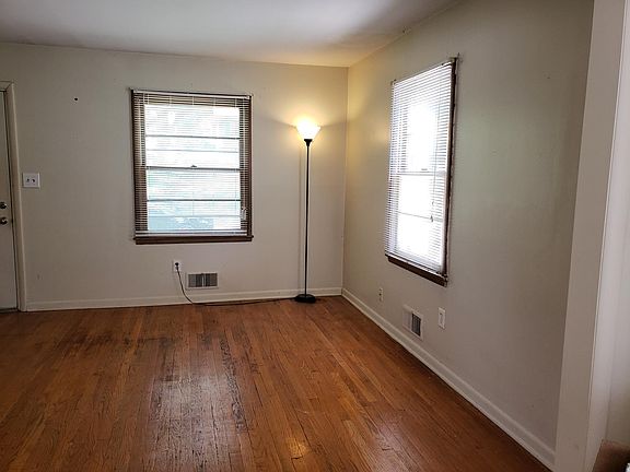 Open floorplan looking from dining room into living room