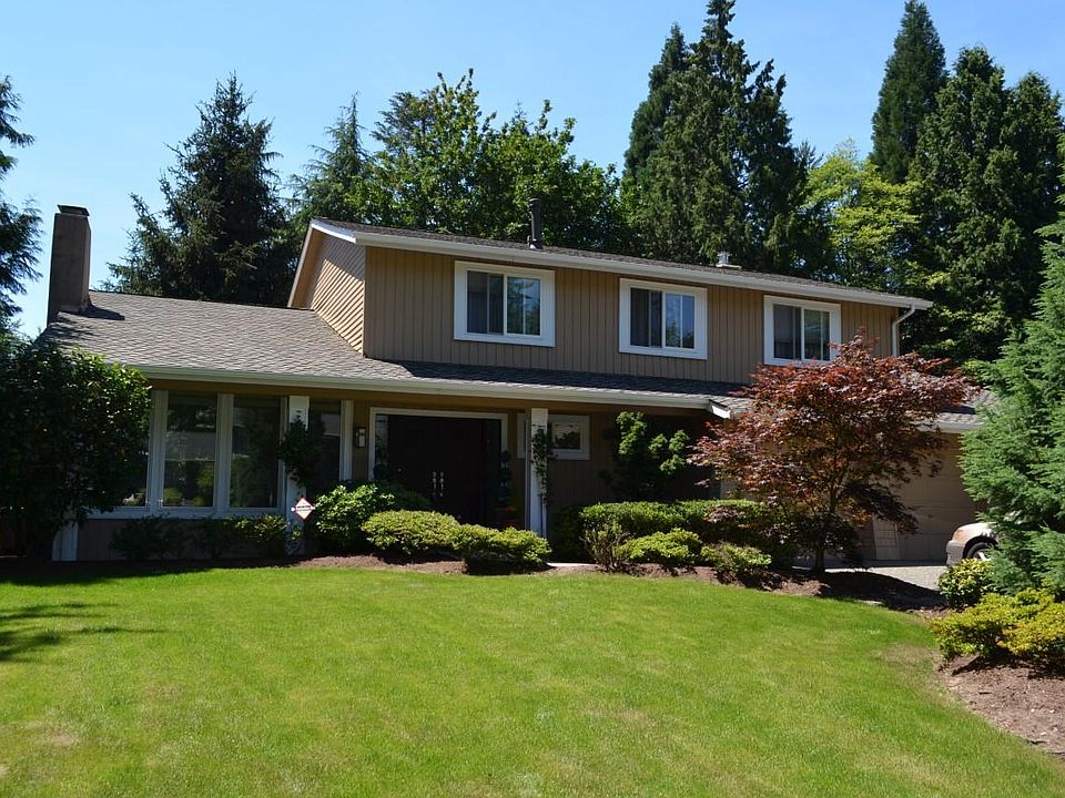 View from street, front yard, 2 car attached garage