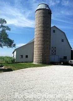 Huge barn- East side of property
						:
						Electric and water in barn (has stalls)