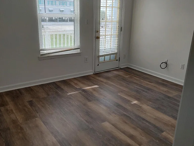 Upstairs front bedroom with new hardwood floors.