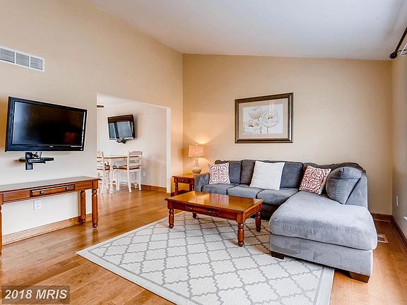 Enjoy the inviting Living Room w/ natural sunlight