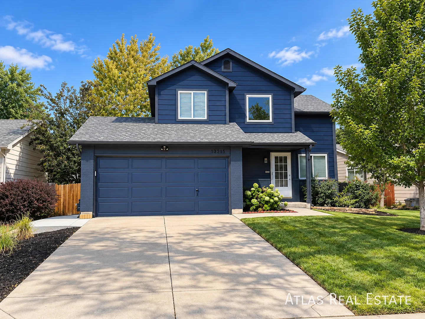 Spacious 2-Bedroom Home with 2-Car Garage, EV Charging Outlet, Basement and Large Fenced Yard! — Photo 1