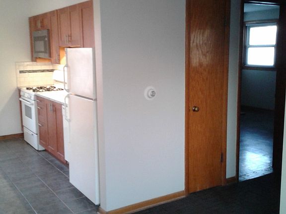 Tenant controls radiant heat. Window air conditioners permitted.