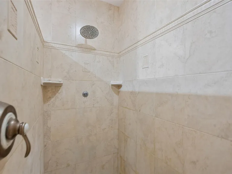 Master shower (there is also a Jacuzzi tub)