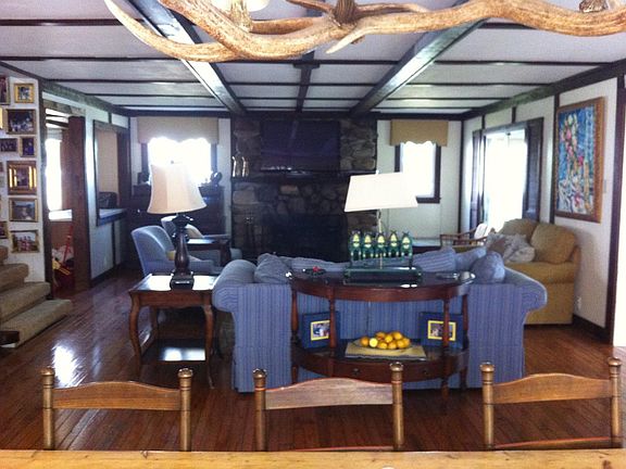 View of the living area from the dining room table. The off