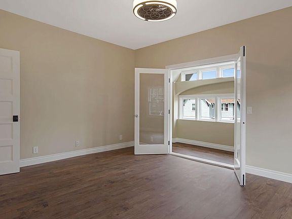 Large Bedroom w/ Sleeping or Office Cove. A Full can fit on one side of the cove.