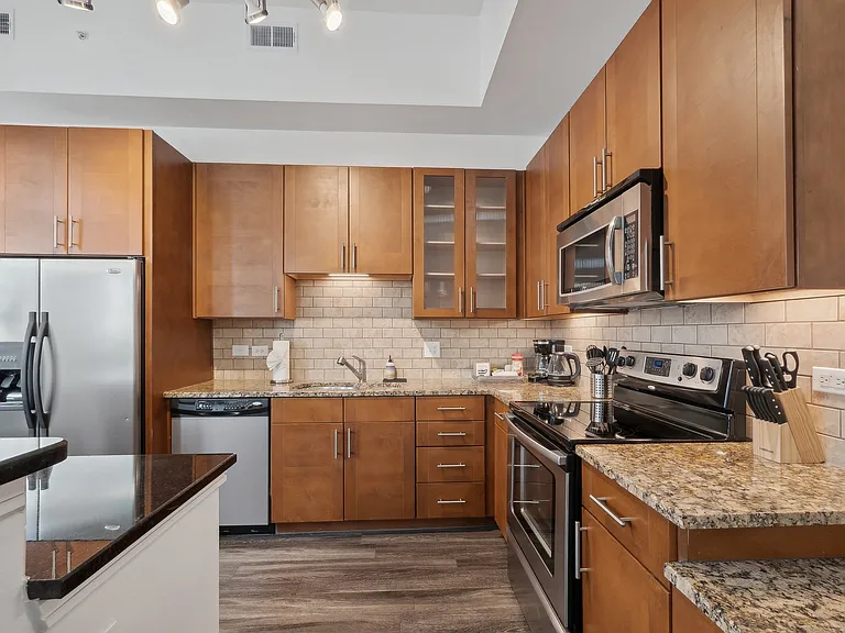 Experience the elegance of this contemporary kitchen, perfect for culinary enthusiasts. Experience the elegance of this contemporary kitchen, perfect for culinary enthusiasts.