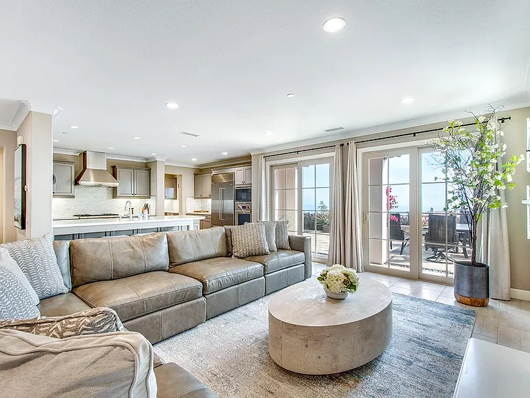 Sitting Area in the Great Room with double doors out to the patio