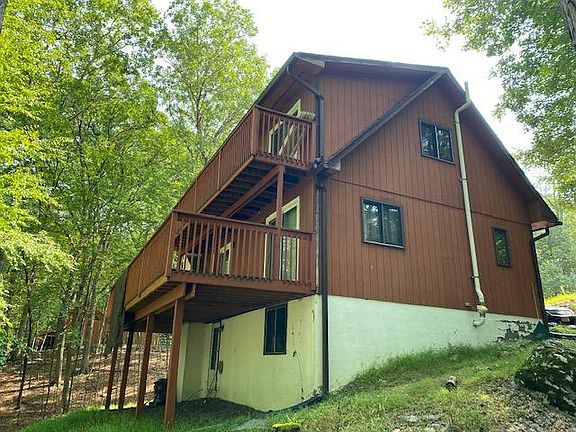 Second floor bedrooms have private deck/balcony space.
