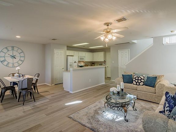 Step downstairs to this open floor plan kitchen, dining and family room.