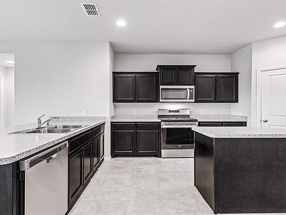 All Photos shown here may not depict the specified home & features included are for illustration purposes only