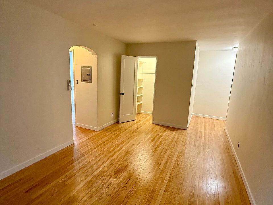 Refinished Classic Hardwood Floors, New Lighting, New Base Board and Paint throughout