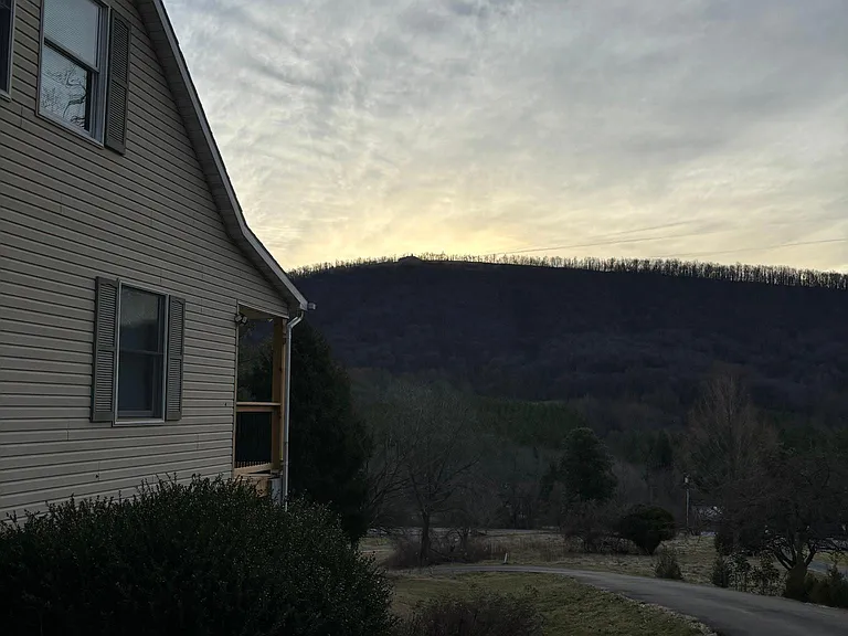 Side of house, and mountain view
