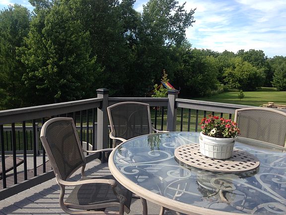 deck overlooking tree line