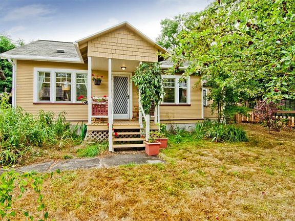 Charming Cottage on a huge level lot