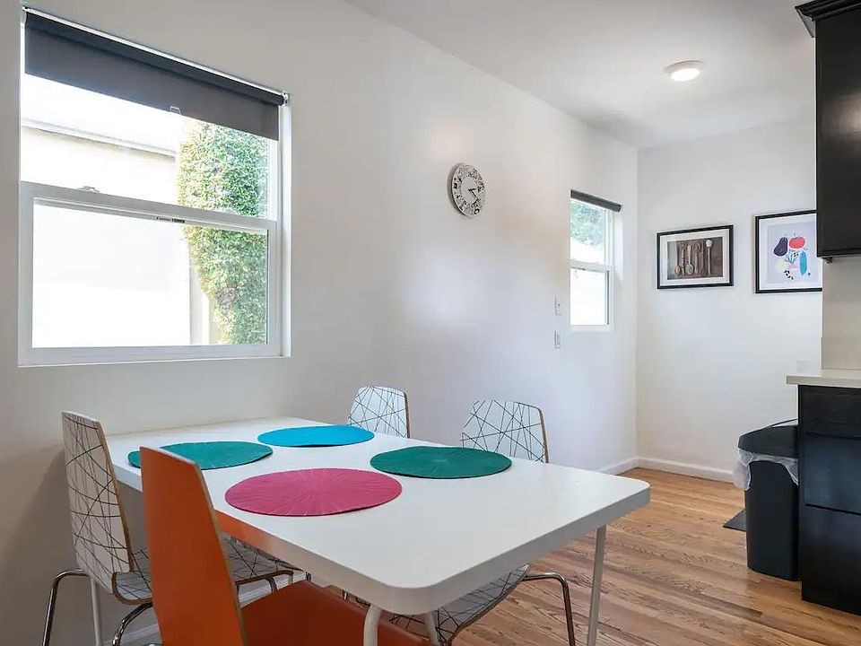 Kitchen & dining area with back door to private patio