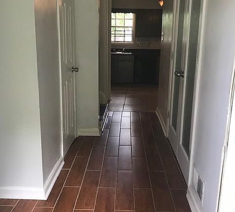 Front entrance/door to the living room and dining room on right