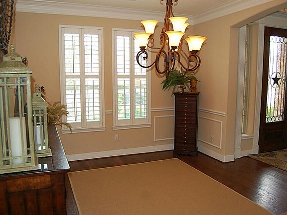 Another view of Formal Dining. Notice Plantation Shutters.