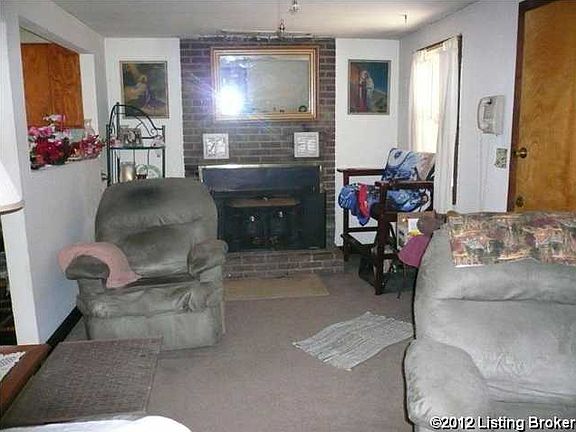 Also in the living room, you will find a woodburning insert in the fireplace.