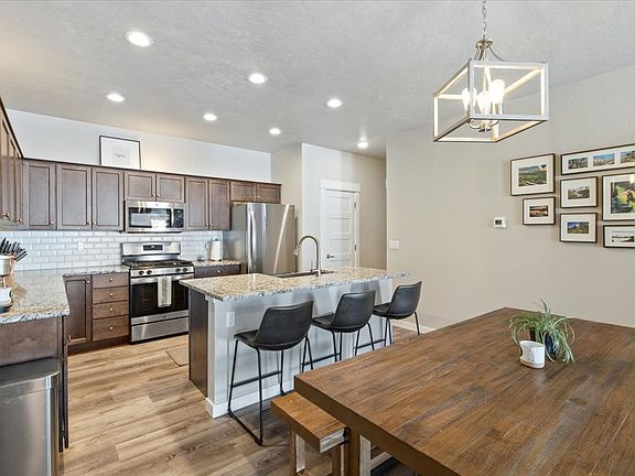 Granite counter tops, stainless steel appliances and ample light