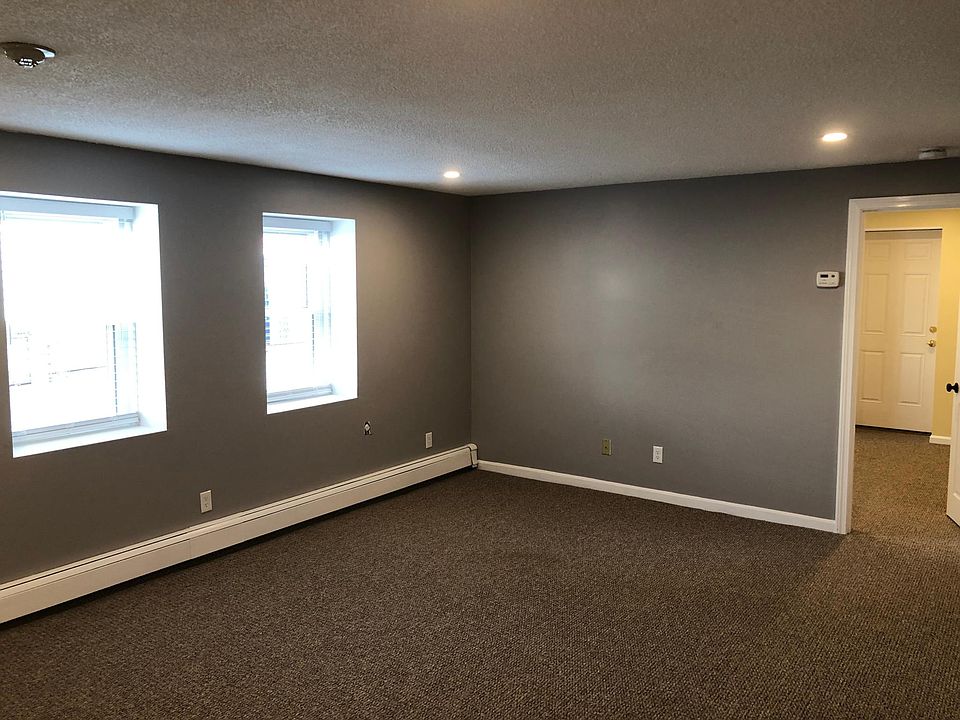 Living room with direct access to bedroom.