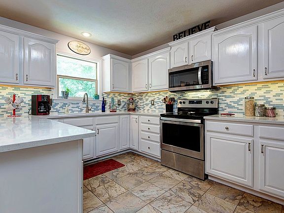 New glass tile backsplash. 