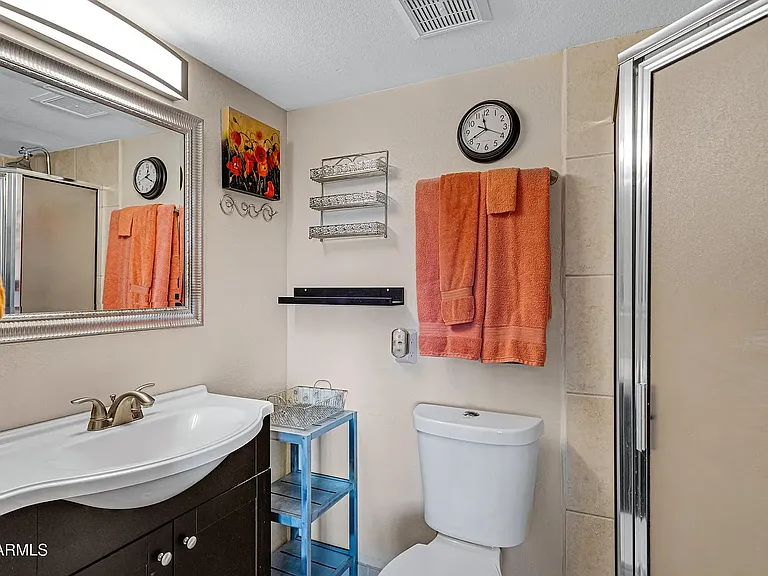 Main ensuite bath
corner shower, single vanity, dual flush toilets
