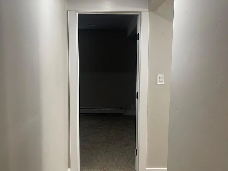 Downstairs hall looking into room #4 on lower level
